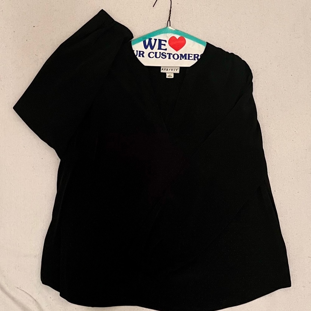 Black polka dot blouse